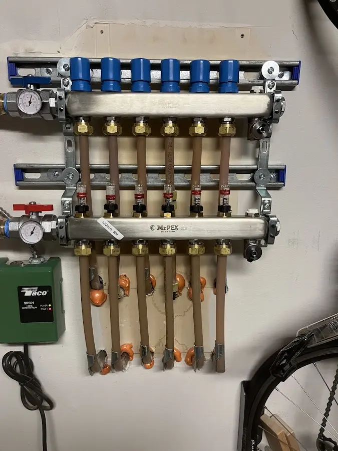 Plumber performing Water Heater Repair at a residential property in Concord